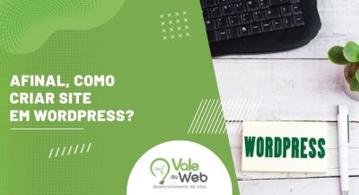 Imagem com a frase 'Afinal, como criar site em WordPress?' ao lado de um teclado, uma planta e um bloco com a palavra WordPress, representando criação de sites.
